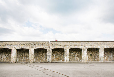 mauthausen, Austria - May 10,2014 man over the wall inside the mauthausen camp in Austria during a...