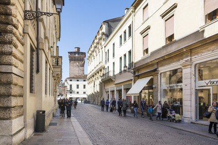 Vicenza,Italy-April 3,2015:People and tourist stroll in the famous Palladio street in the historic centre of Vicenza.Here are ahead the palace Thiene Bonin during a sunny day.のeditorial素材