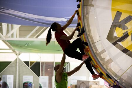 Bologna,Italy-May 31,2015:an athlete climbing on an artificial wall for training indoorのeditorial素材