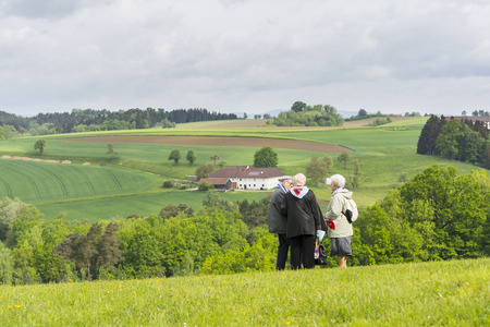 Mauthausen, Austria-May 10.2015: a group of ex-deportee observes the landscape around the camp of Mauthausen where he was imprisoned more than seventy years ago during the celebration of the anniversary of the liberation of the camp.のeditorial素材