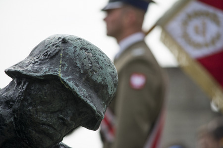 Mauthausen, Austria-May 10.2015: military celebration of the Mauthausen camp liberation by all the countries involved paying tribute to the fallen through military parades and floreal wreaths on monuments during a sunny day.のeditorial素材