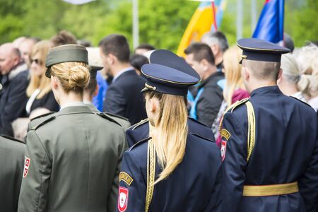 Mauthausen, Austria-May 10.2015: military celebration of the Mauthausen camp liberation by all the countries involved paying tribute to the fallen through military parades and floreal wreaths on monuments during a sunny day.のeditorial素材