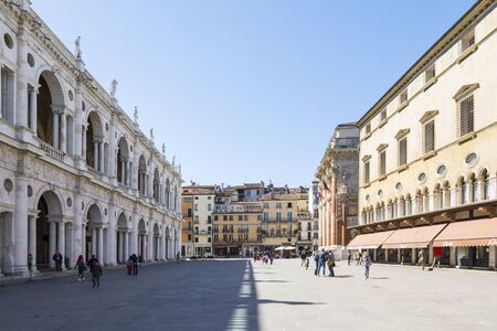Vicenza,Italy-April 3,2015:people walk and admire  the famous town square  named Piazza dei Signor in Vicenza, Italy during a sunny day.のeditorial素材