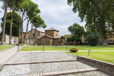 Ravenna,Italy-august 21,2015:view of exterior of Galla Placidia mausoleum from the San Vitale garden's during a cloudy day.のeditorial素材