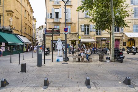 Aix en provence,France-August 9,2016:People strolling down the typical street and square of Aix-en-Provence during a summer day.のeditorial素材