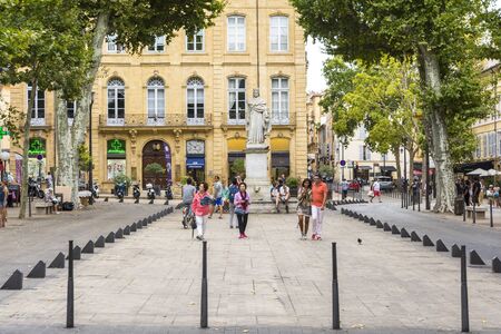 Aix en provence,France-August 9,2016:People strolling down the typical little square of Aix-en-Provence during a summer day.のeditorial素材