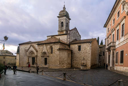 San Quirico d'Orcia,Italy-april 24,2016:Church in the  San Quirico town square during a cloudy day.のeditorial素材