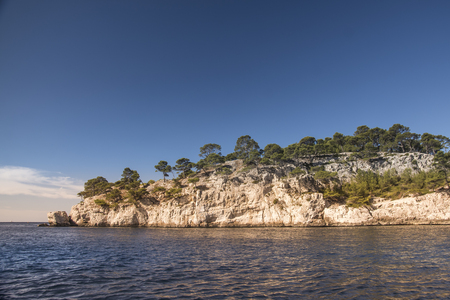 View from the sea of a part of the nature park of the creeks near the French city of Cassis during a sunny dayの写真素材