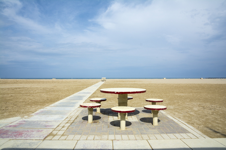 Coffee table at the beach in Rimini-Italy-during a sunny dayの写真素材