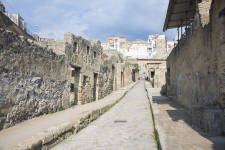 Ercolano, Italy- March 26, 2016: Columns and ruins inside the Herculaneum archeological site near Naples during a summer day.のeditorial素材