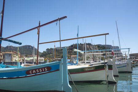 Cassis,France-august 10,2016:The port of Cassis, a French village with colorful boats moored on a summer day.のeditorial素材