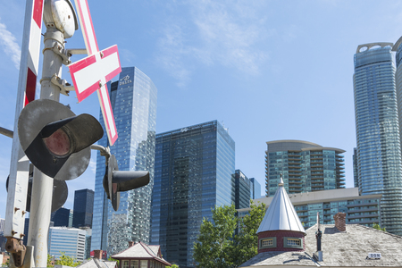 Toronto,Canada-august 2,2015:railroad crossing sign in downtown of Toronto inside the Toronto railway museum during a sunny day.のeditorial素材