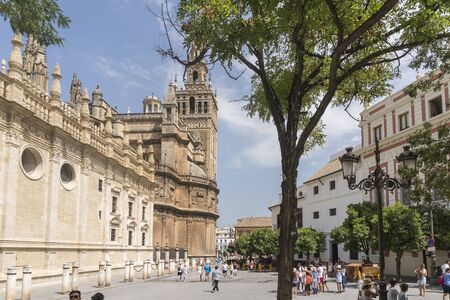 Sevilla,Spain-august 7,2017:view of the details of the seville cathedral and the giralda tower during a sunny day.のeditorial素材