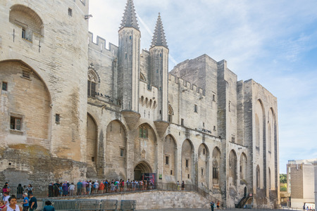 Avignon,France-august 12,2016:torist in line to visit the Palace of the Popes, famous christian landmark in France during a sunny dayのeditorial素材