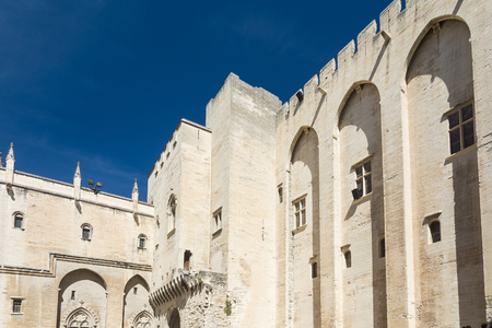Avignon,France-august 12,2016:torist visit the Palace of the Popes, famous christian landmark in France during a sunny dayのeditorial素材