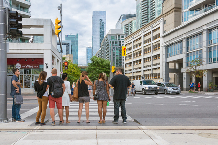 Toronto,Canada-august 3,2015:People stroll in the central street of downtown Toronto on a sunny dayのeditorial素材