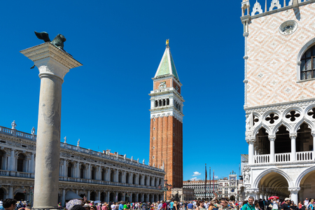 Venice,Italy -August 17,2014:Tourists visiting the famous Piazza San Marco in Venice during a sunny dayのeditorial素材