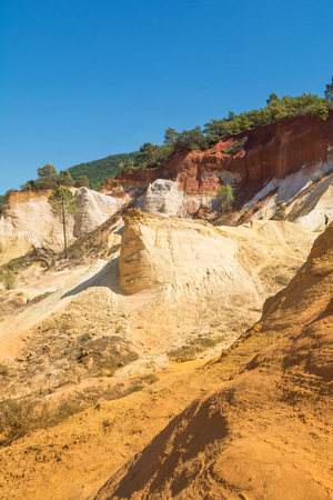 Roussilion,France-august 13,2016:tourists visiting the famous Ocra color quarries near Roussillon in...