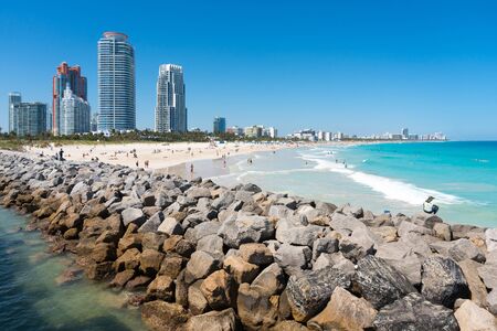 Miami,USA-march 15,2018:people on hte beach in Miami beach south point park pier during a sunny day.のeditorial素材