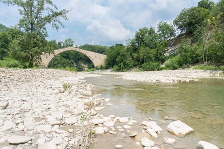 view of the Alidosi bridge located in the municipality of Castel del Rio and built in the...