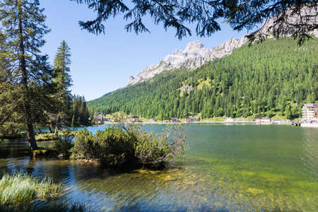 Misurina, Italy - August 23, 2016:view of the lake and hotels in the heart of the Belluno Dolomites during a sunny dayのeditorial素材