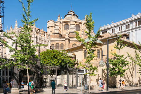 Granada, Spain-august 11, 2017: strolling in Granada near the cathedral during a sunny day.の写真素材