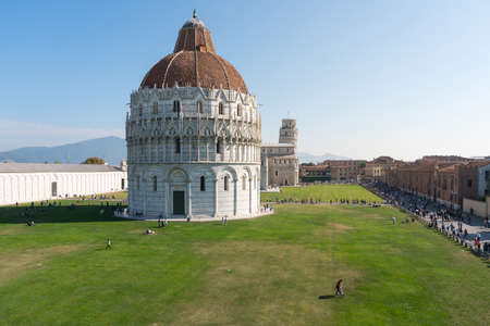 Pisa, Italy-October 21, 2018: view of the famous leaning tower and the medieval cathedral located in the famous square of miracles in Pisaのeditorial素材