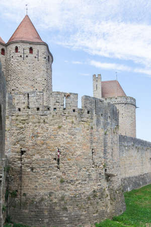 Carcassonne, France-august 15,2016: The famous walls of the fortified medieval city of Carcassonne during a sunny dayのeditorial素材