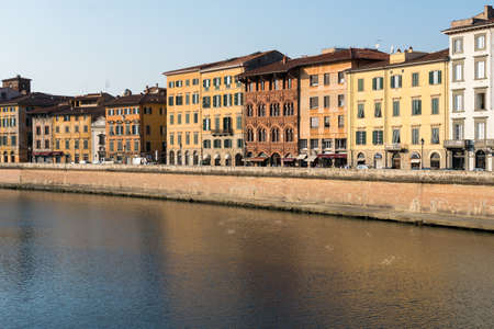 Pisa, Italy-October 21, 2018: view of the Arno river tha crosses Pisa during a sunsetのeditorial素材