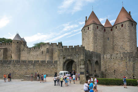 Carcassonne, France-august 15,2016: people visit the famous fortified medieval city of Carcassone during a sunny dayのeditorial素材