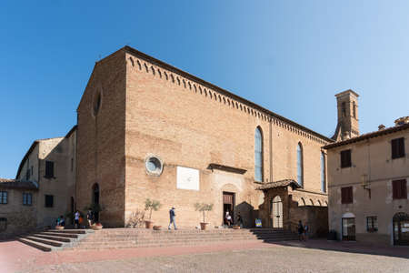 San Gimigniano, Italy-august 8,2020: view of the church of Saint Agostino during a sunny dayのeditorial素材