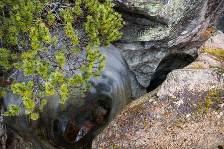 Potholes of the giants, at one of the stops of the Bernina trainの写真素材