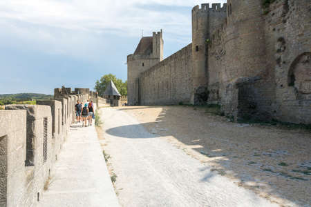 Carcassonne, France-august 15,2016: people visit the famous fortified medieval city of Carcassone during a sunny dayのeditorial素材