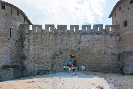 Carcassonne, France-august 15,2016: people visit the famous fortified medieval city of Carcassone during a sunny dayのeditorial素材