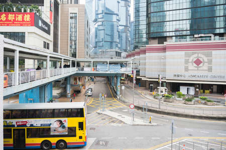 Hong Kong, March 24,2019: Strolling among the skyscrapers through the streets of Hong Kong during a cloudy dayのeditorial素材