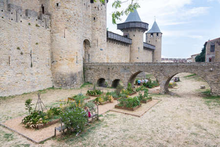 Carcassonne, France-august 15,2016: people visit the famous fortified medieval city of Carcassone during a sunny dayのeditorial素材