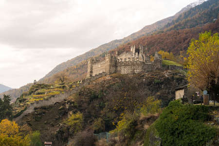 Grosio, Italy-november 4, 2018: view of the San Faustino castle in province of Sondrio during a cloudy dayのeditorial素材