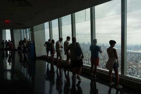New York City, USA - August 7, 2019: people admire the New York city from the Sky portalon the top...