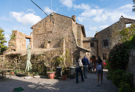 Civita di Bagnoregio, Italy-april 30,2018: people visit Civita di Bagnoregio during a sunny day.Defined "the dying city" because it was built on a tuff spur destined to collapseのeditorial素材