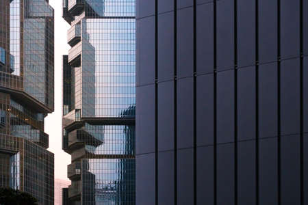 Hong Kong, March 24,2019: Strolling among the skyscrapers through the streets of Hong Kong during a cloudy dayのeditorial素材