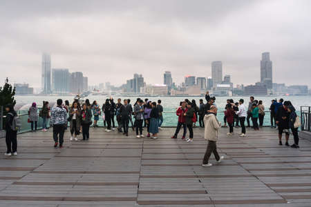 Hong Kong, March 24,2019: Strolling among the skyscrapers through the streets of Hong Kong during a cloudy dayのeditorial素材