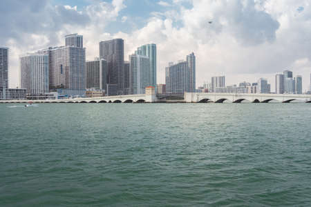 Miami, USA-March 19,2018: Miamy skyline with moored boats during a cloudy dayのeditorial素材