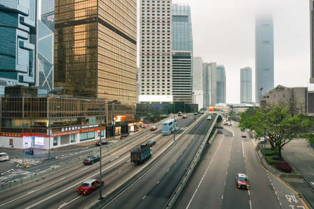 Hong Kong, March 24,2019: Strolling among the skyscrapers through the streets of Hong Kong during a cloudy dayのeditorial素材