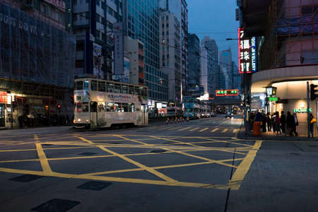 Hong Kong, March 24,2019: Strolling among the skyscrapers through the streets of Hong Kong during a cloudy dayのeditorial素材