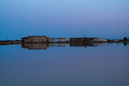Walk through the famous saltern of Cervia-Italy during the eveningの写真素材