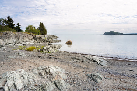Strolling in the National Parc du Bic between the sea and beautiful landscapes during a summer dayのeditorial素材