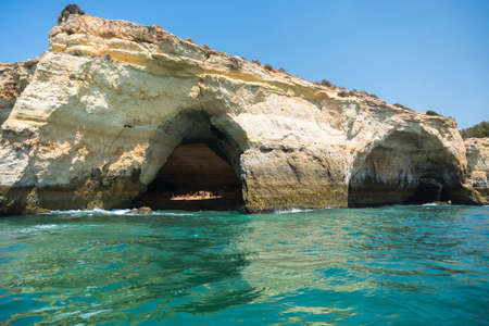 View from the boat of the beautiful Algarve coast in southern Portugal during a sunny dayの写真素材