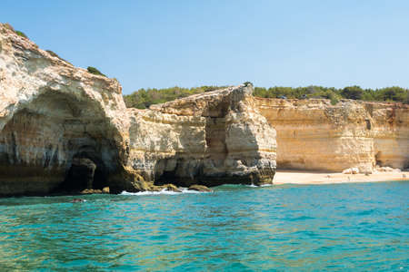 View from the boat of the beautiful Algarve coast in southern Portugal during a sunny dayの写真素材