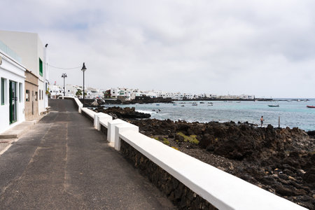 Lanzarote, Spain - August 7,2018: view of the small town of Punta Mujeres on the island of Lanzarote famous for its natural swimming pools during a cloudy dayのeditorial素材