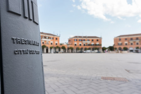Tresigallo, Italy-may 2, 2021: view of Repubblic square in Tresigallo during a cloudy dayのeditorial素材